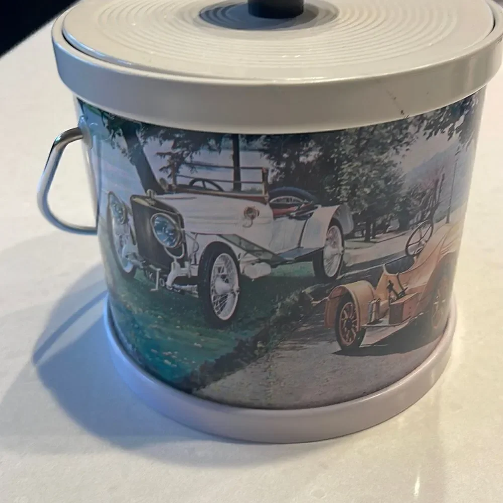 Vintage classic ice bucket, old automobiles. Super cool great for your bar.